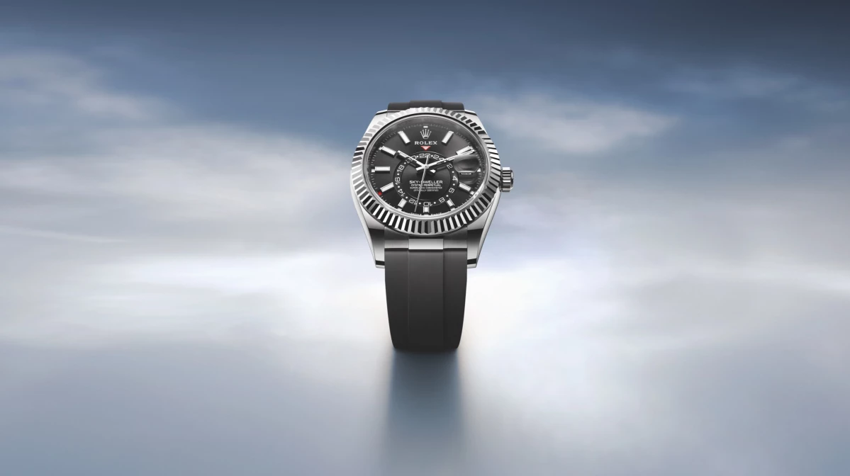 Rolex Sky-Dweller with a silver case and a bright black dial