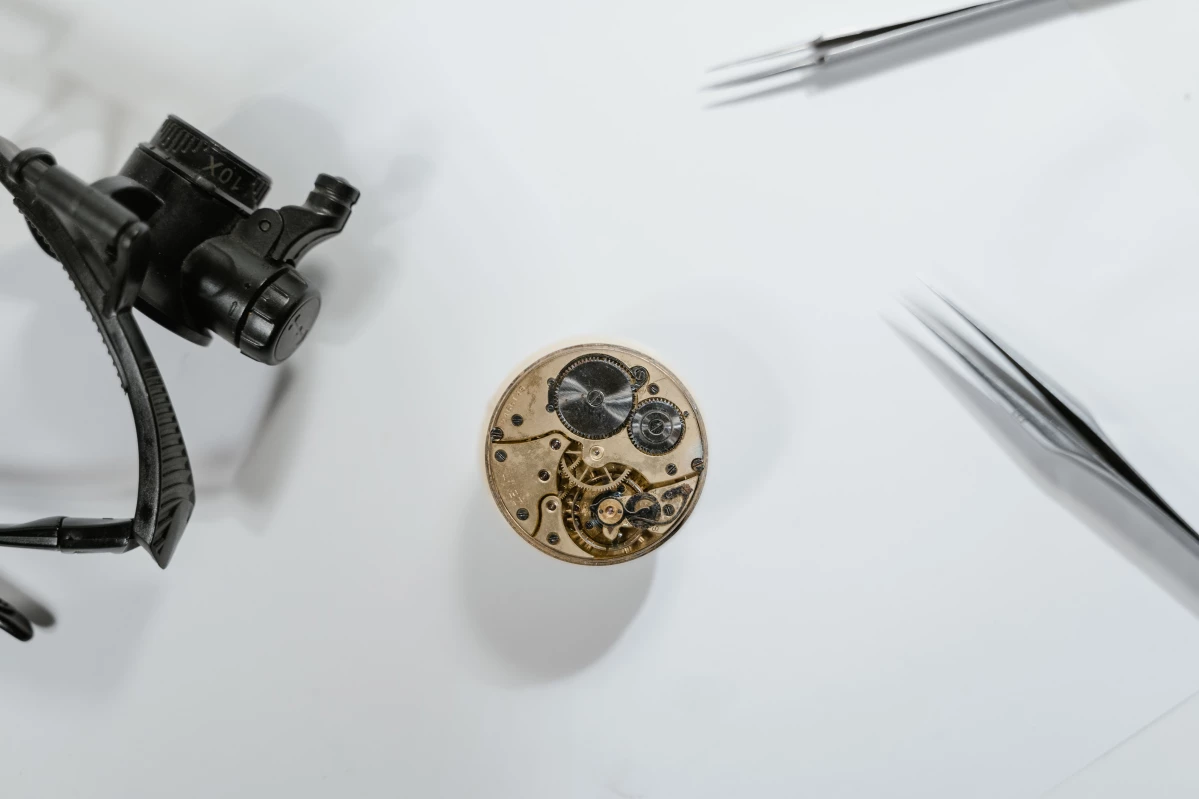 The movement of a watch about to undergo a repair