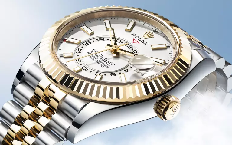 Rolex Sky-Dweller with a yellow gold case and intense white dial