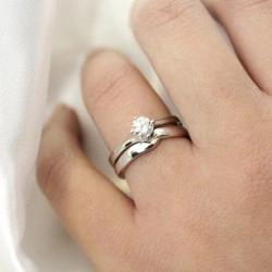 18ct White Gold Gentle Curve Wedding Ring with solitaire engagement ring on hand