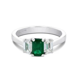 Platinum Octagonal 0.69ct Emerald and Diamond Three Stone Ring flat front
