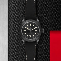 TUDOR Black Bay Ceramic on a black leather and red blotter pad