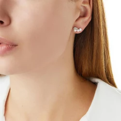 Yoko London Sleek White Gold Pearl and Diamond Wave Earring in ear