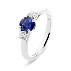 18ct White Gold 0.70ct Oval Cut Sapphire & Diamond Trilogy Ring