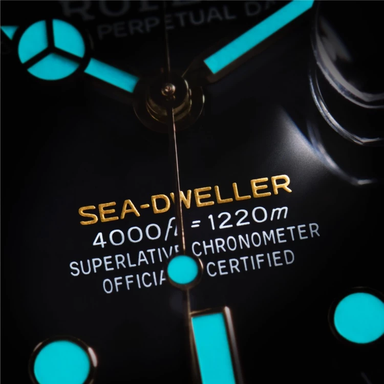 A close up of the Rolex Sea-Dweller intense black dial