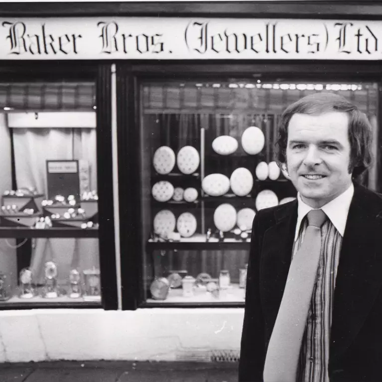 Mr Coleman in front of Baker Brothers Bedford