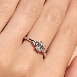 Platinum Oval & Pear Cut Diamond Trilogy Style Ring on model