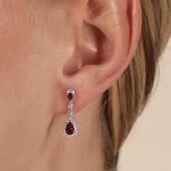 18ct White Gold Ruby & Diamond Pear Shape Drop Earring on a model