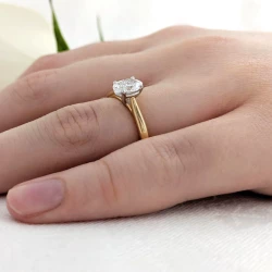 Classic Oval 18ct Yellow Gold 0.60ct Diamond Engagement Ring on hand