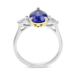 Pear cut tanzanite and diamond white gold ring with yellow gold setting upright view