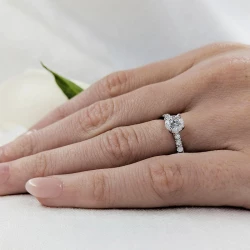 Skye Classic Platinum & 0.70ct Diamond Solitaire Ring on hand close up