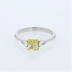 Platinum Fancy Yellow Radiant Diamond & Pear Cut Diamond Trilogy Style Ring 360 Degrees Spin Video