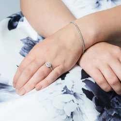 Skye Platinum & Diamond Cluster Engagement Ring paired with diamond tennis bracelet