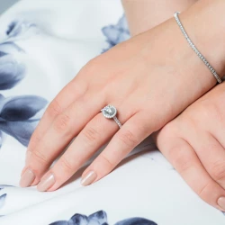 Skye Platinum Diamond Cluster Engagement Ring paired with diamond set tennis bracelet