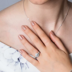 Skye Platinum Diamond Cluster Engagement Ring paired with diamond set wedding band