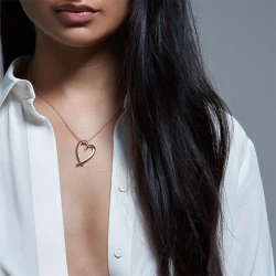 Shaun Leane Large Rose Gold Hook Heart Pendant on female model