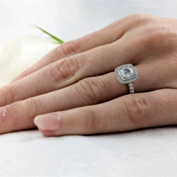 Skye Brava Platinum & 0.70ct Diamond Halo Ring on hand