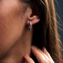 Skye Platinum 0.72ct Diamond Hoop Earrings in ear