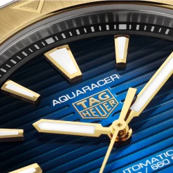 TAG Heuer Aquaracer Professional 200 Smokey blue dial and gold bezel close up
