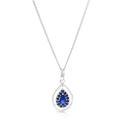 Teardrop shaped sapphire surrounded by smaller round sapphires set in 9ct white gold with a chain necklace